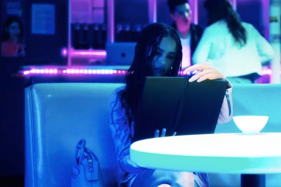 A neon-lit scene from Gemini.