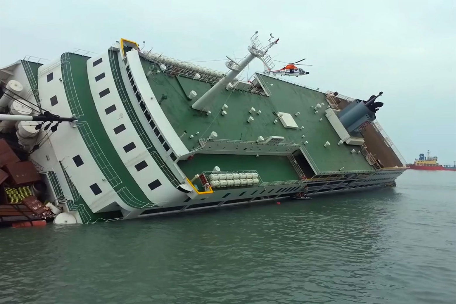 A ship flipped over on its side.