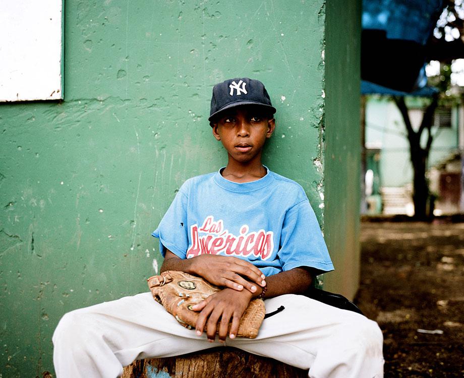 SANTO DOMINGO, DOMINICAN REPUBLIC. A portrait of a young pitcher in Santo Domingo.