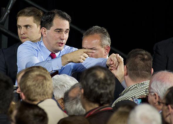 Wisconsin Gov. Scott Walker greets supporters at his election night victory party on Nov. 4, 2014, in West Allis, Wisconsin.