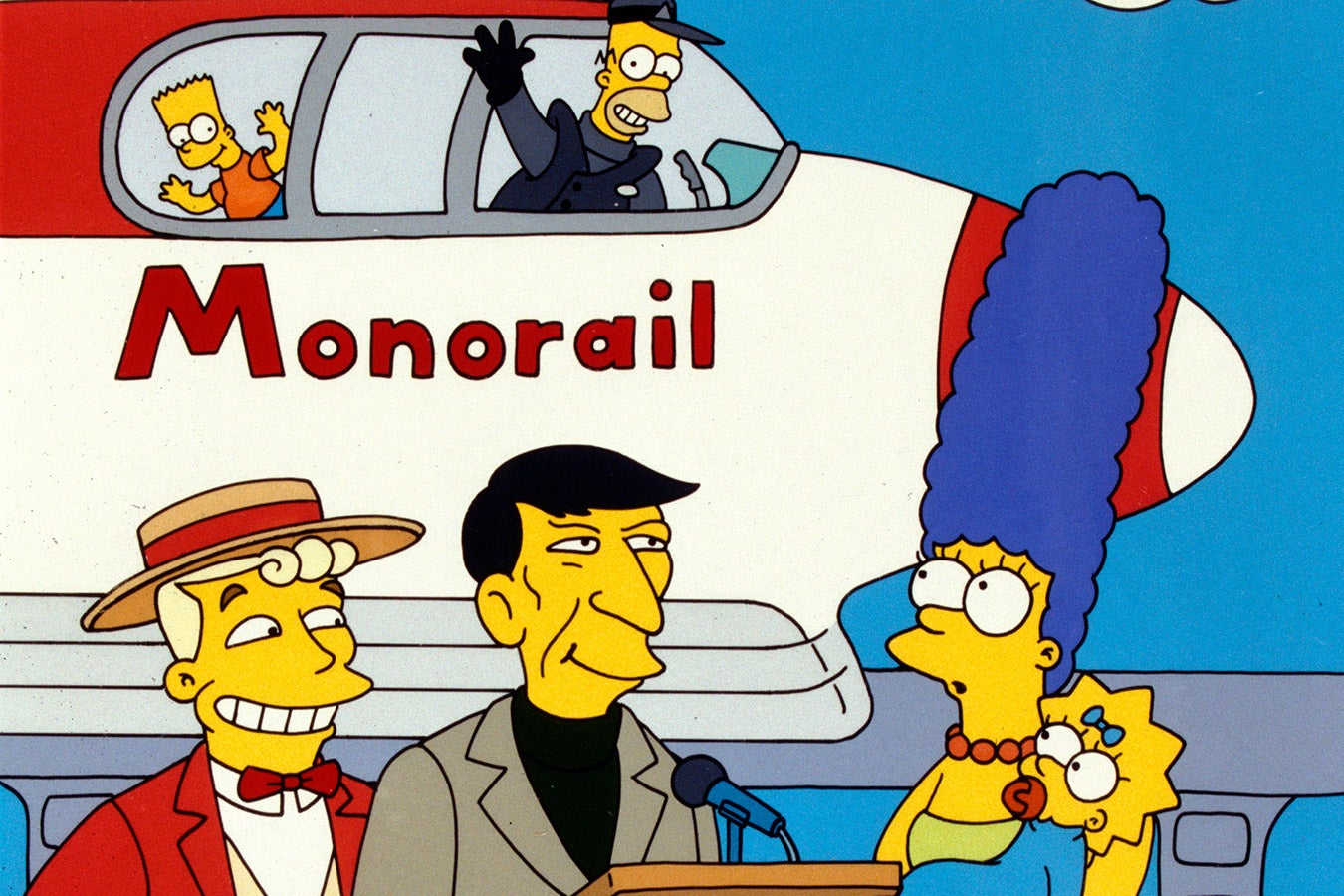 Bart and Homer wave from the monorail, while Marge, Lisa, and two men look on from the ground.