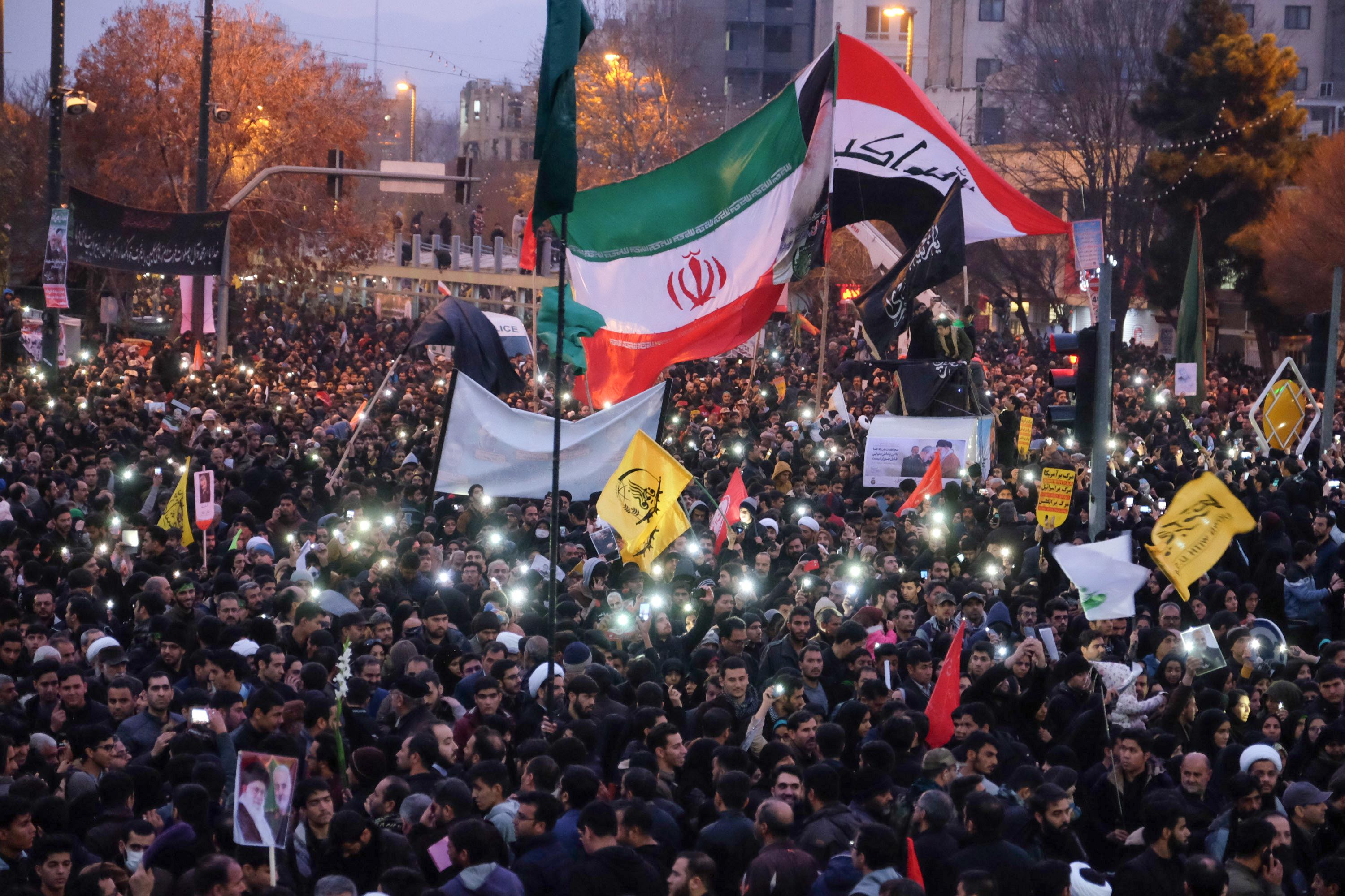 Iranians gather in the northeastern city of Mashhad on January 5, 2020 to pay homage to top general Qasem Soleimani and others after they were killed in a US strike in Baghdad. 
