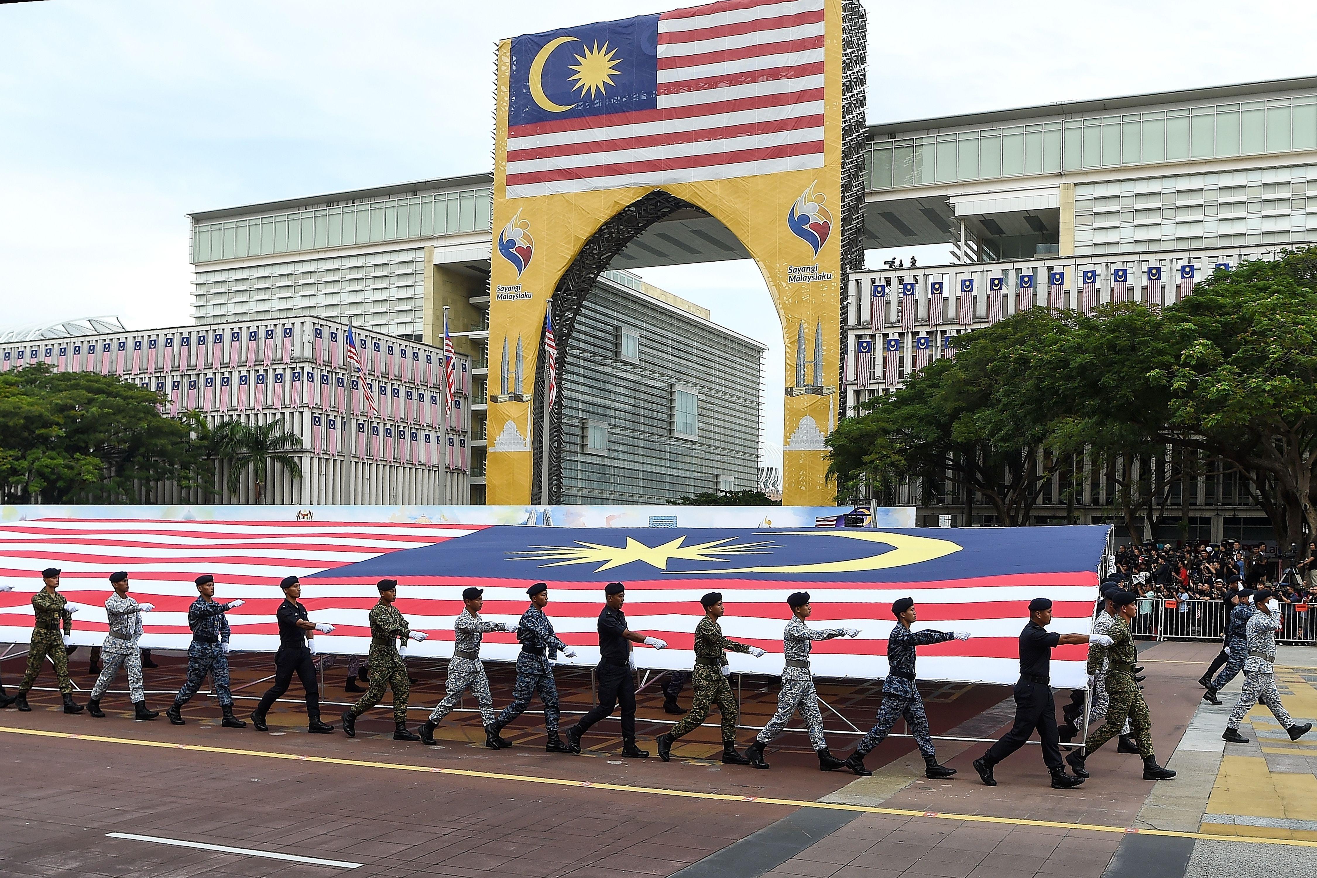 Two gay Malaysian women caned as punishment for same-sex relationship.