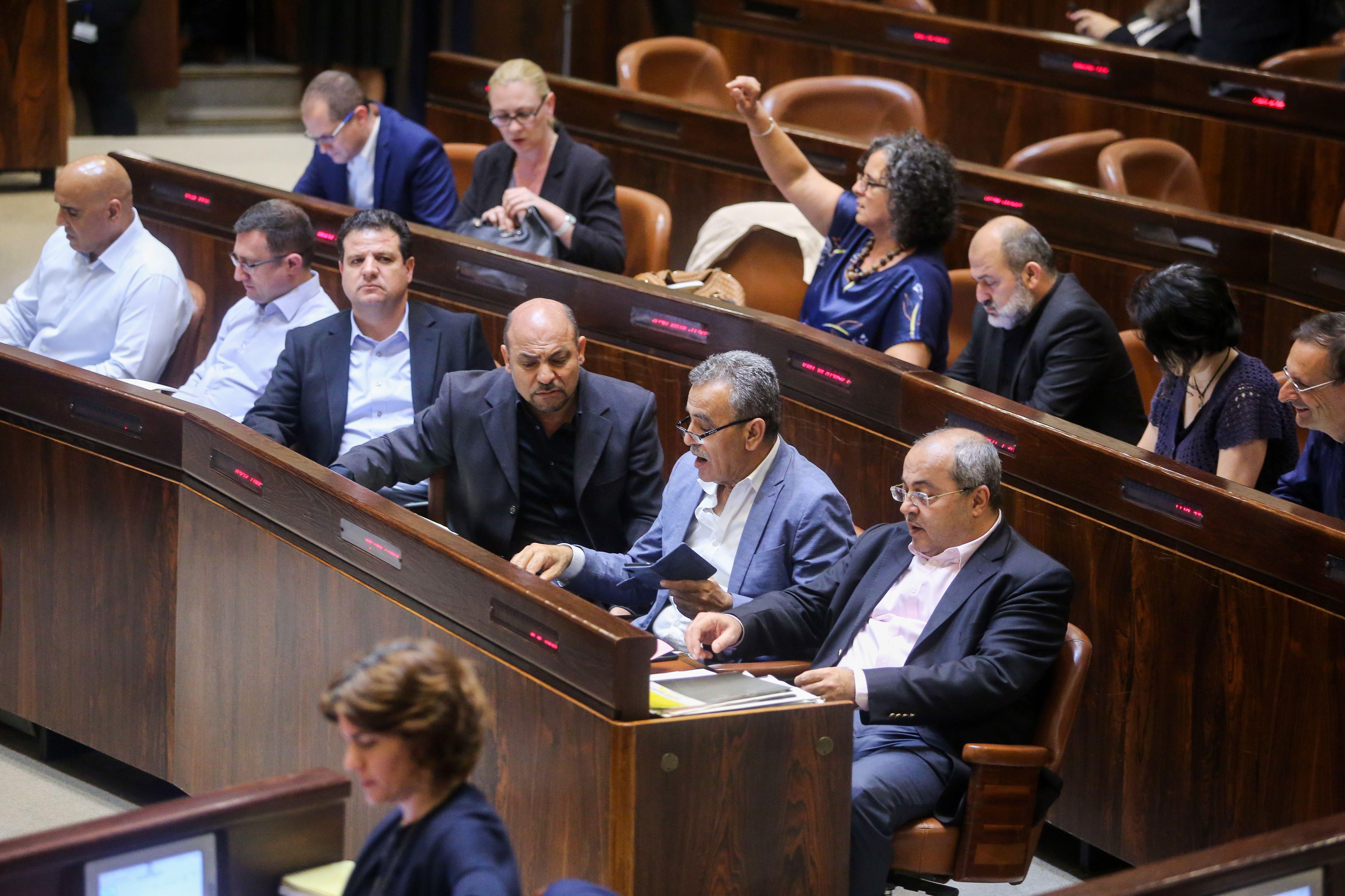 Members of the Israeli parliament sit in the Knesset.