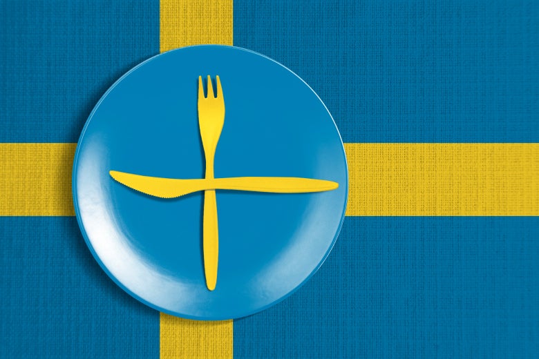 The Sweden flag adorns a dinner plate. 