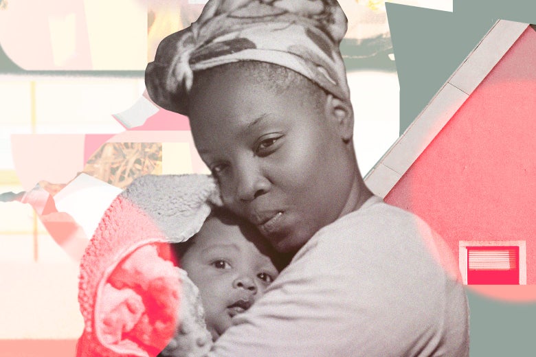 A woman in a head wrap holds a baby in a towel.