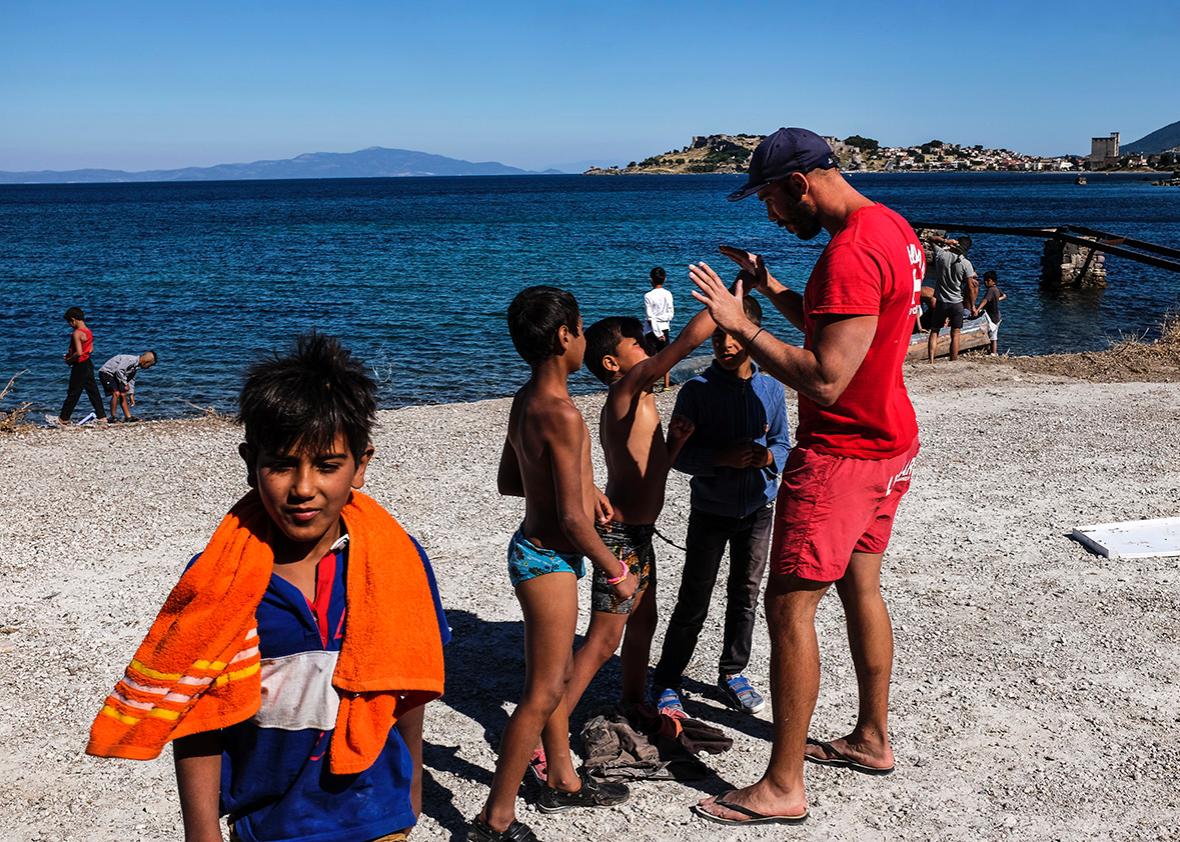 Nikolaos Mavreas with his swimming students on June 12. 