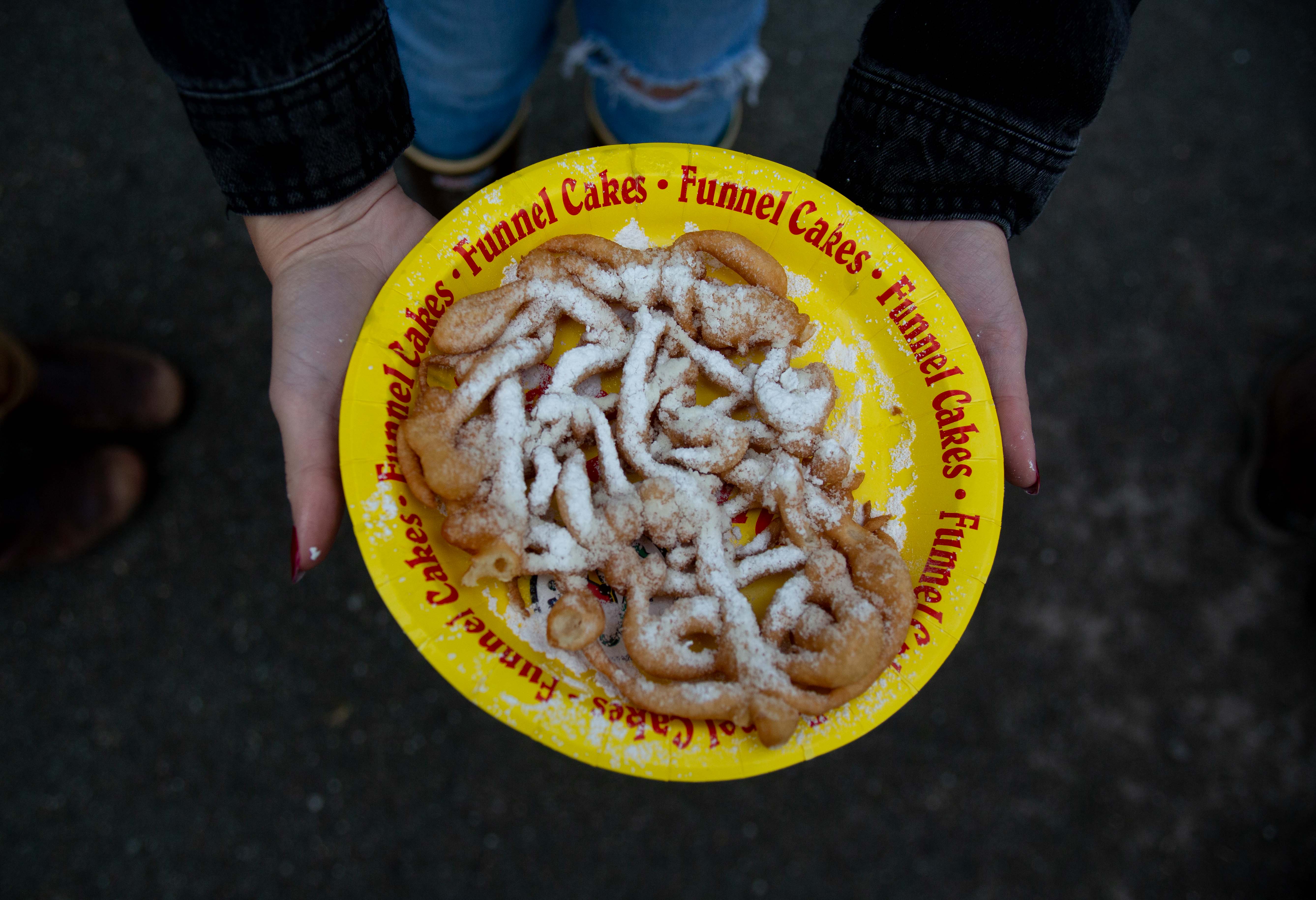 Funnel cake on a plate.