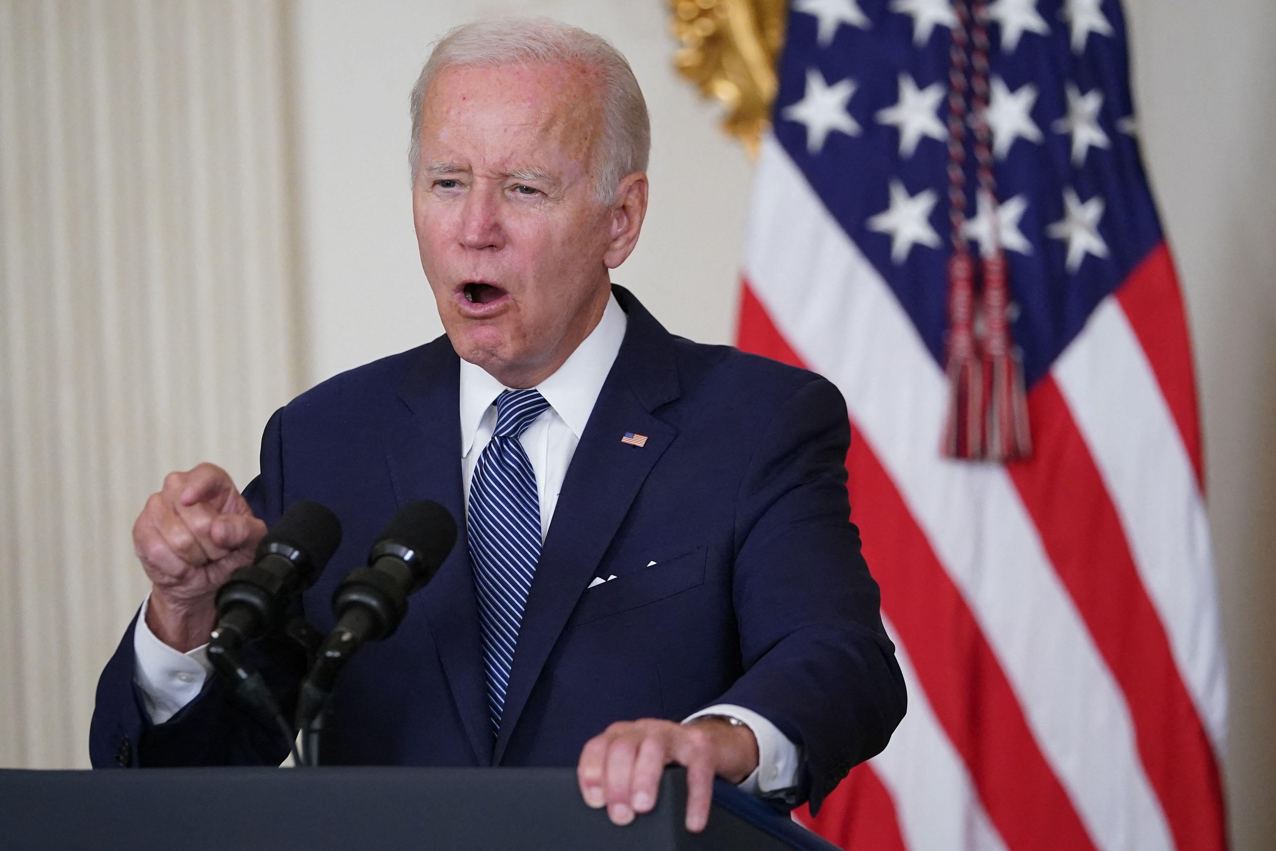 Biden shouting and pointing his finger.