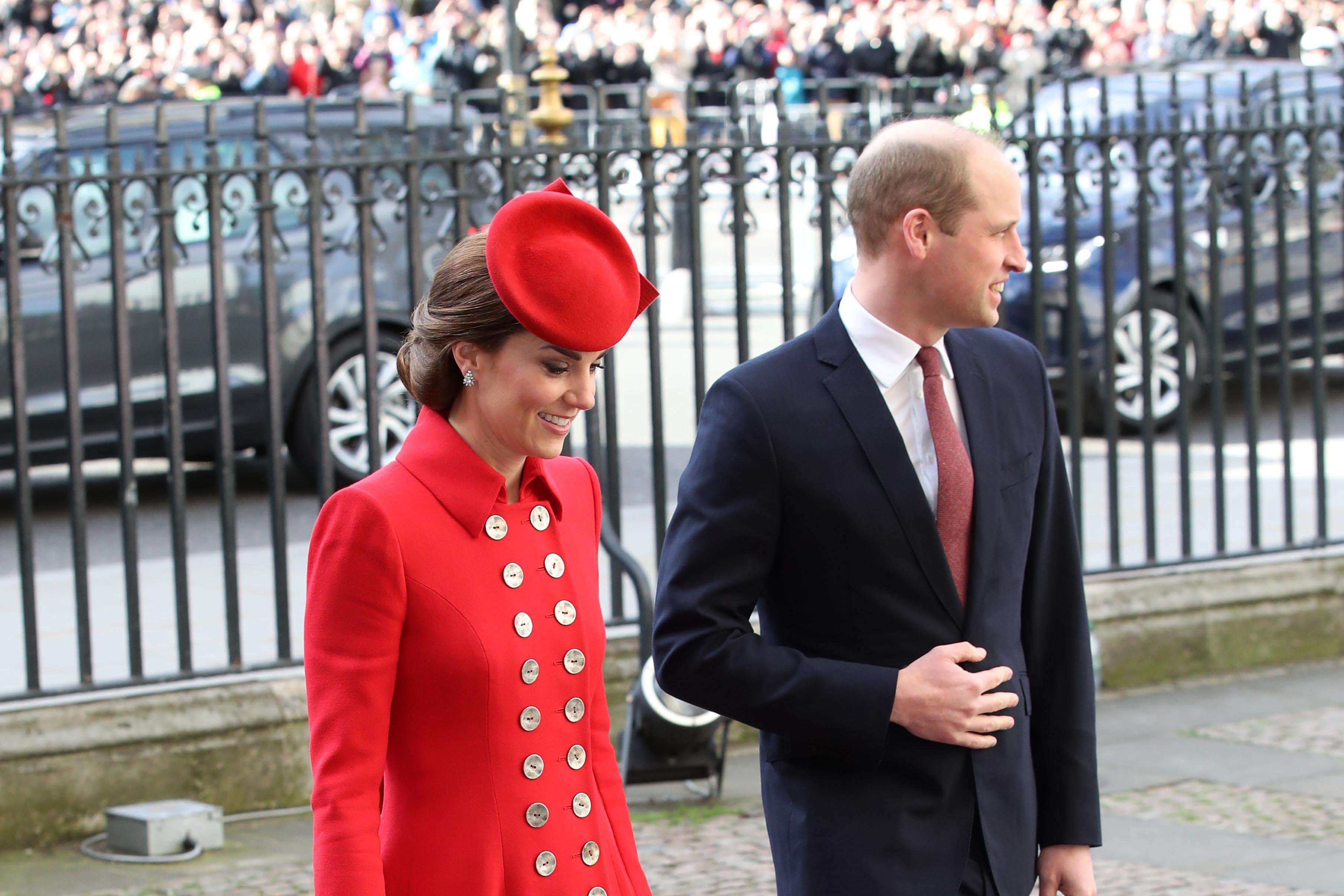 Kate Middleton and Prince William walk into Westminster Abbey.