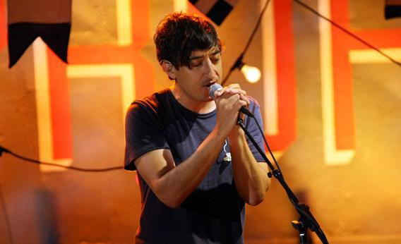 Lead singer Edward Droste of the indie rock band 'Grizzly Bear' performs on stage.