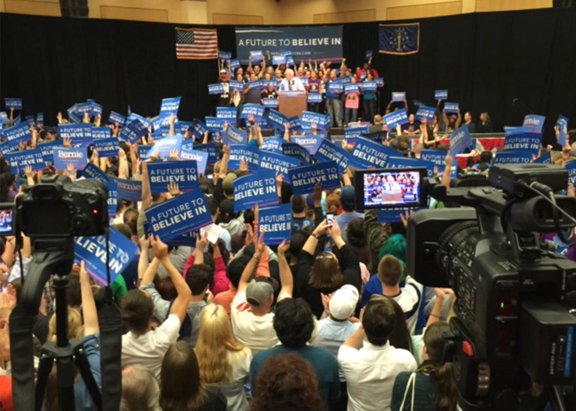 Head on shot of Bernie and people with signs is in South Bend.