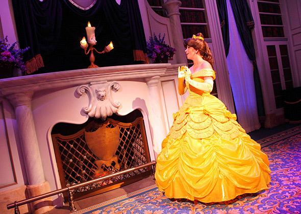 Belle speaks with Lumière during Enchanted Tales With Belle in new Fantasyland