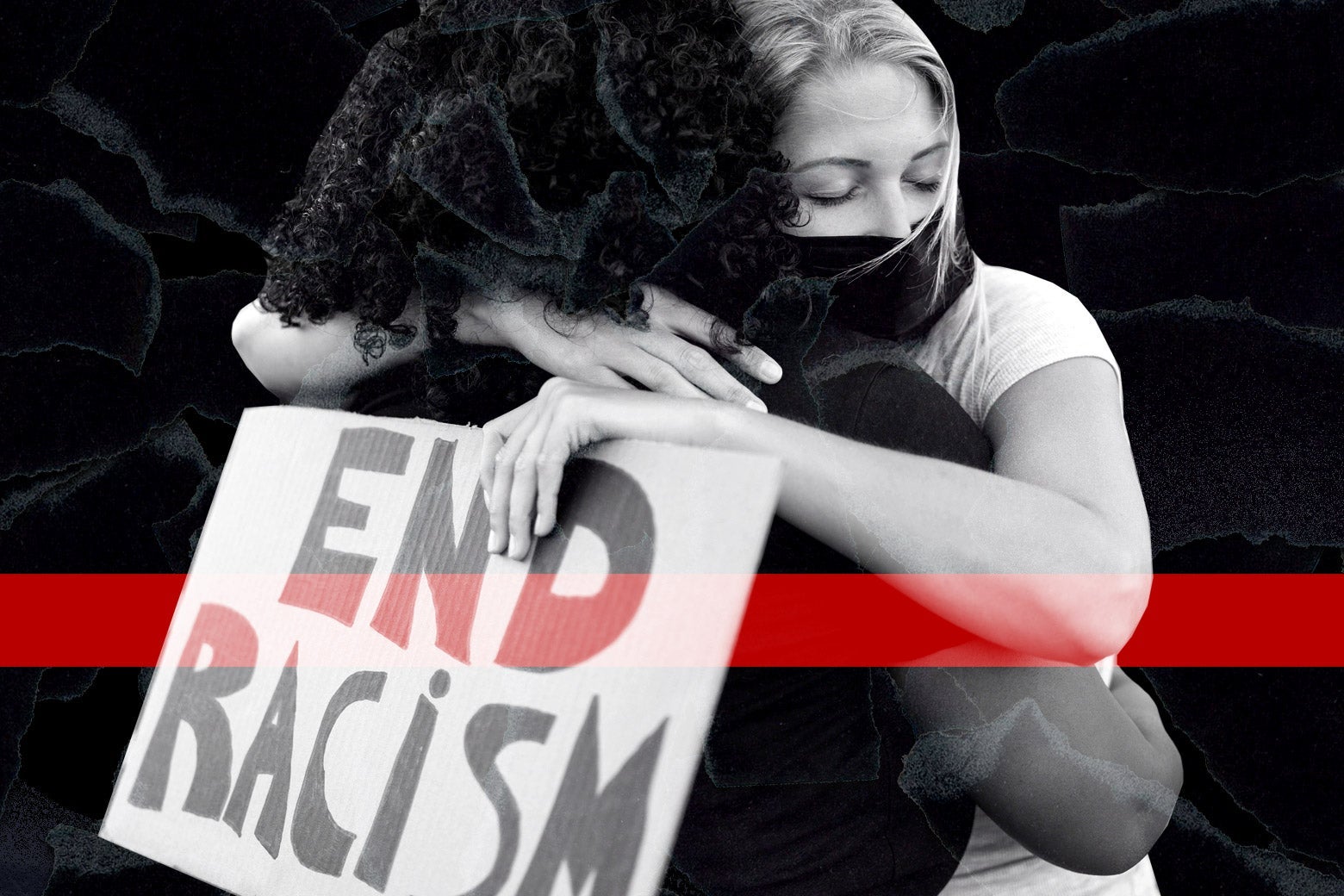 A white woman with an "End Racism" sign hugs a Black woman.