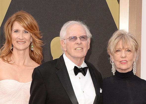 Laura Dern, Bruce Dern and Andrea Beckett attend the Oscars on March 2, 2014 in Hollywood, California. 
