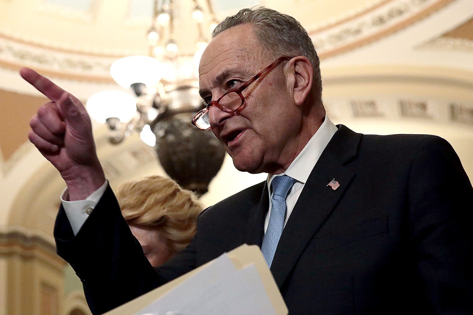 Chuck Schumer speaking and pointing.