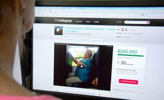 A journalist checks out indiegogo.com, the fundraising website that started accepting donations to send bullied bus monitor Karen Klein on a vacation. 