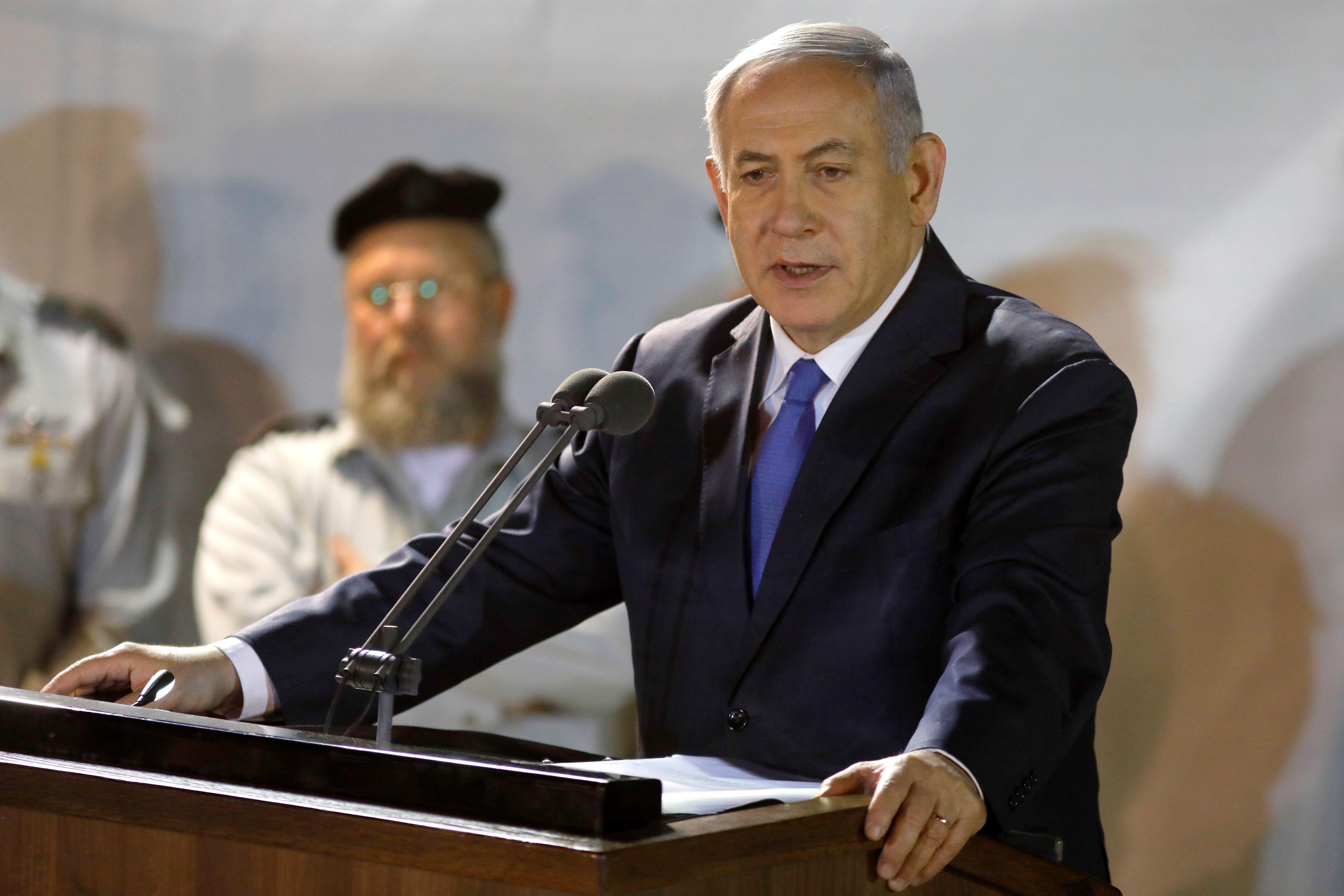 Israeli Prime Minister Benjamin Netanyahu attends the funeral of Sergeant First Class Zachary Baumel at the Mount Herzl military cemetery in Jerusalem on April 4 2019. 