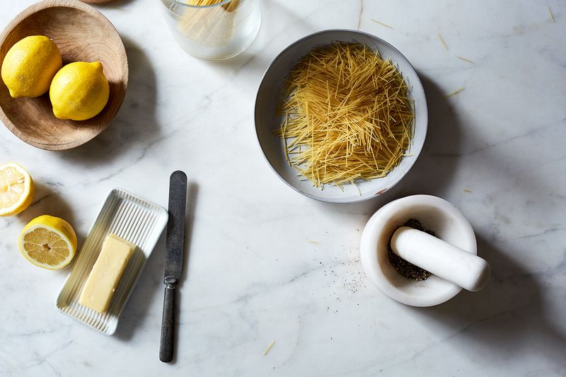 Lemons, butter, and raw angel hair pasta.
