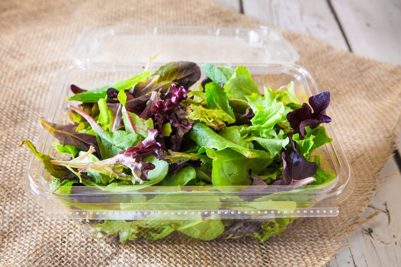 A salad mix in a plastic shell.