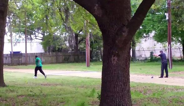 North Charleston police officer Michael Slager (R) is seen allegedly shooting 50-year-old Walter Scott.