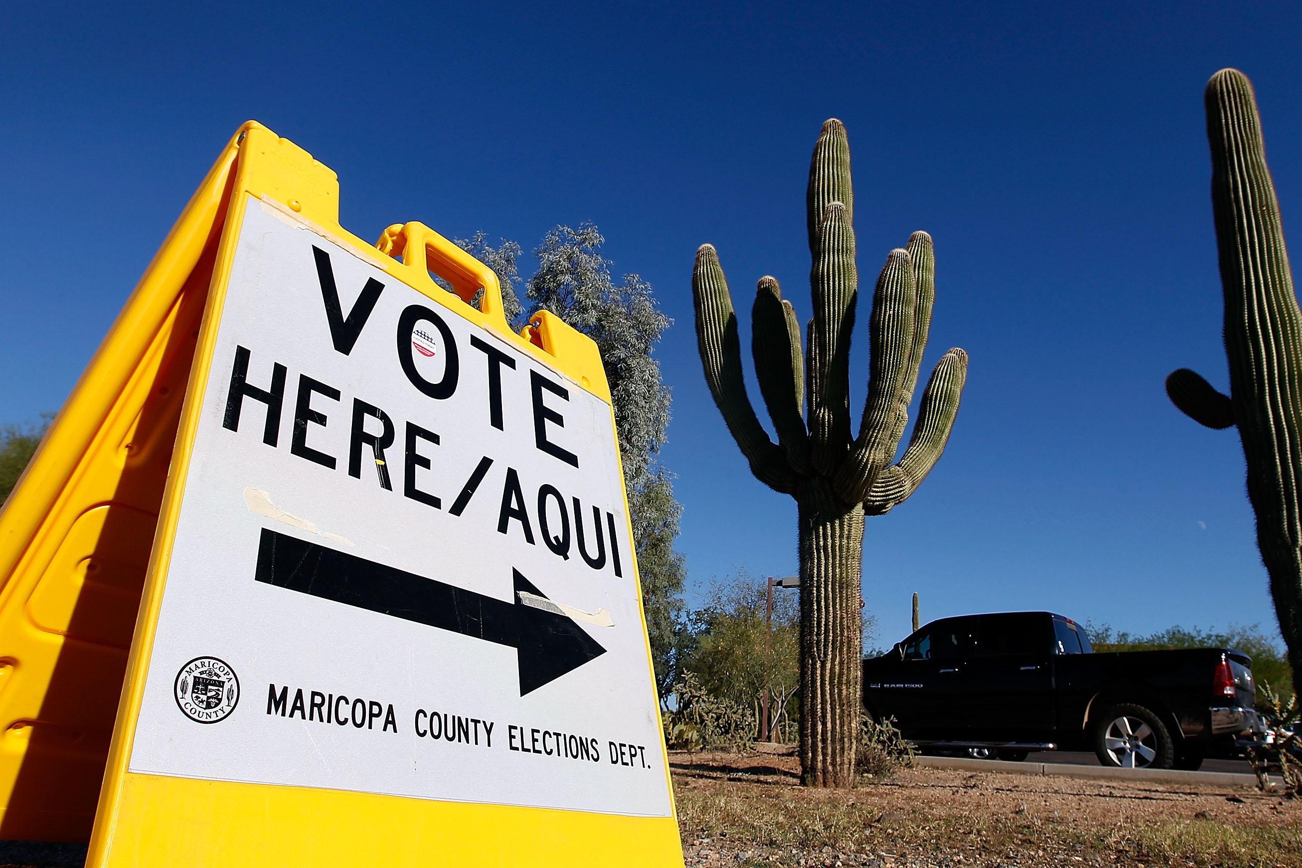 PHOENIX, AZ - NOVEMBER 08:  A Maricopa County Elections Department sign directs voters to a polling station on November 8, 2016 in Cave Creek, Arizona. Throughout the country, millions of Americans are casting their votes today for either Hillary Clinton or Donald Trump to become the 45th president of the United States.  (Photo by Ralph Freso/Getty Images)