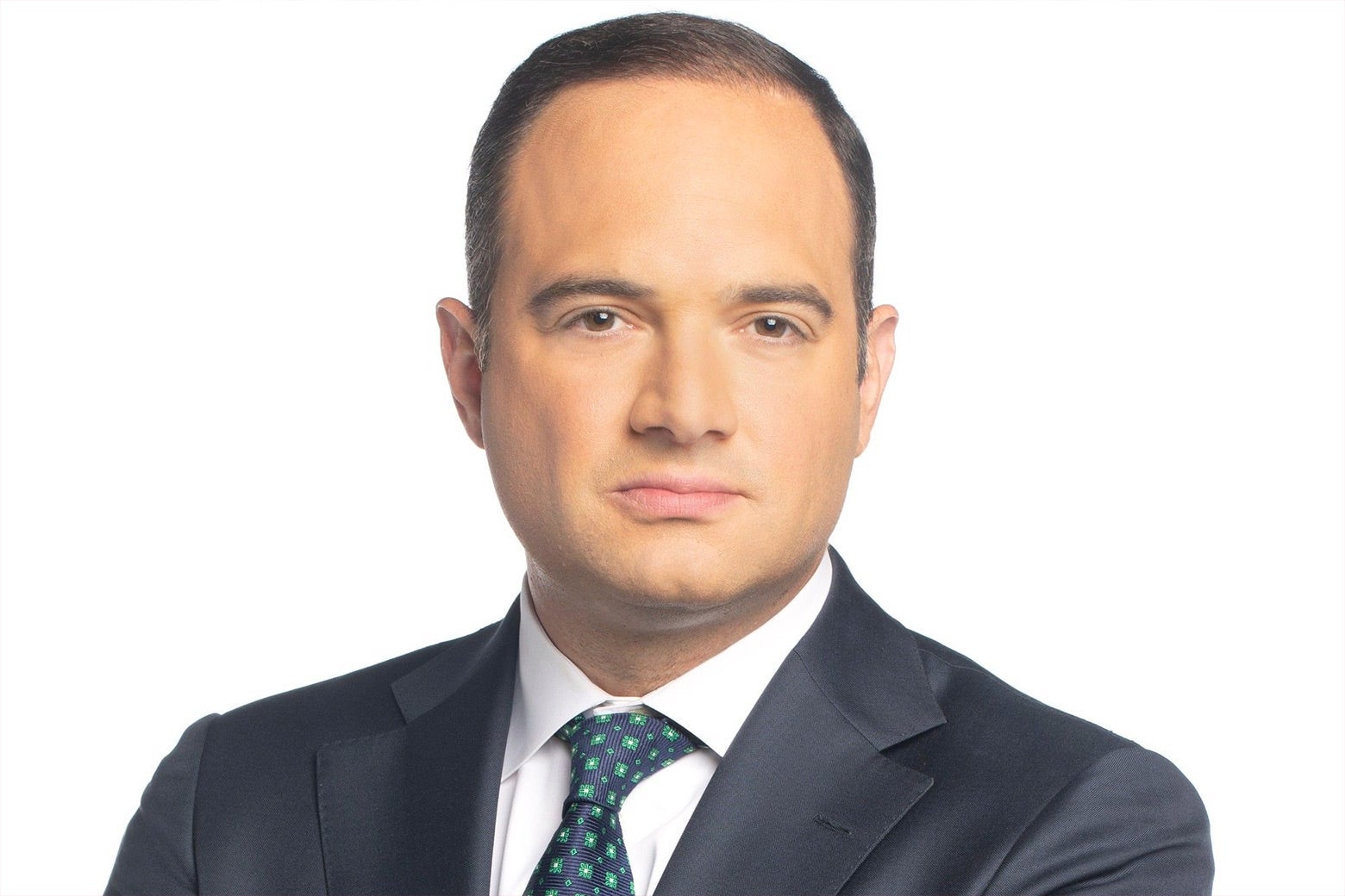 A polished-looking man in a suit.