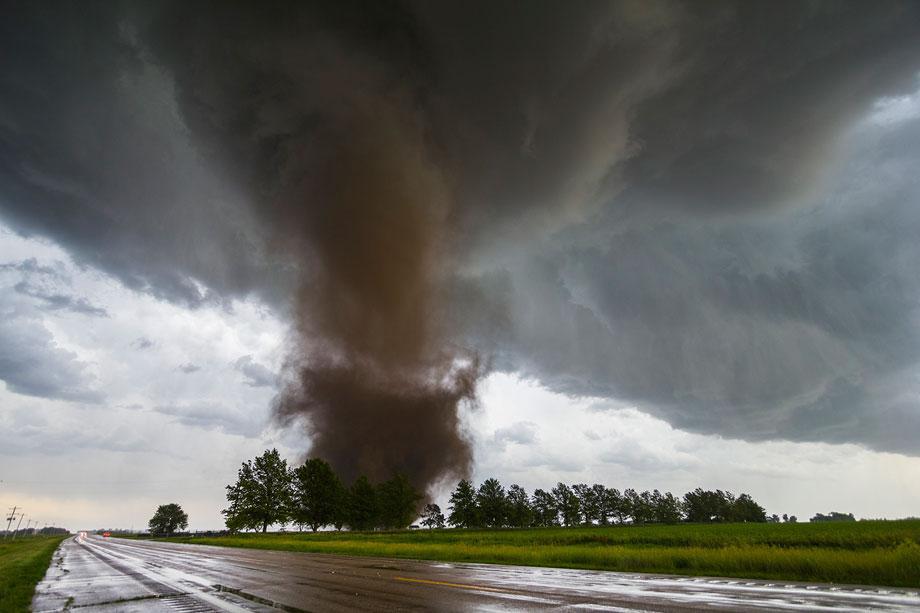 A tornado from a tornadic supercell approaches west of York, Neb., on June 20, 2011.