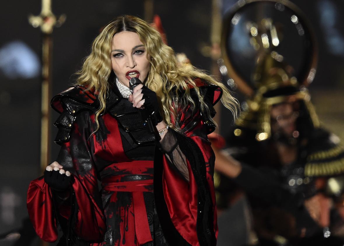Madonna pays tribute to David Bowie by performing “Rebel Rebel” live in