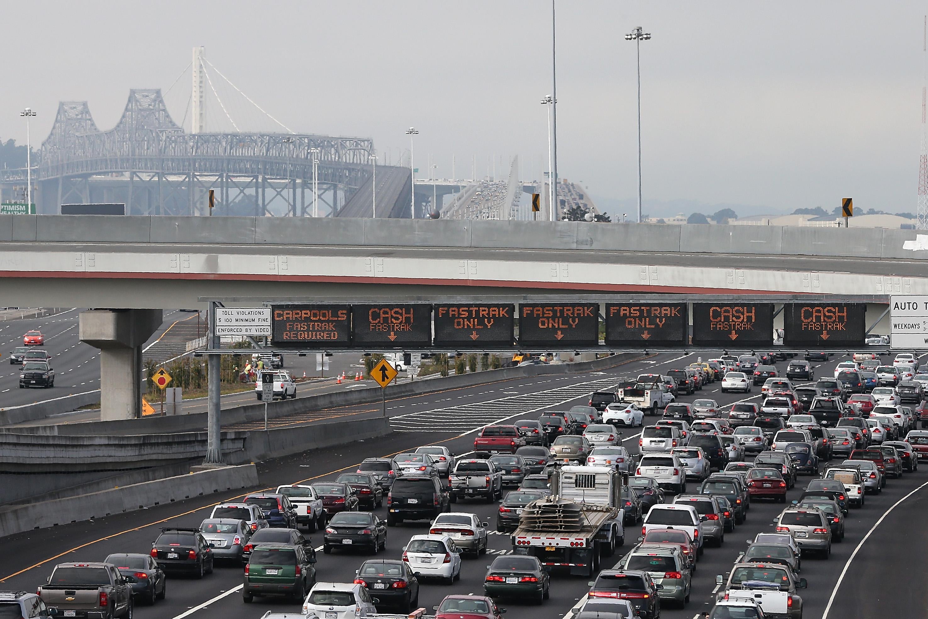 OAKLAND, CA - OCTOBER 21:  Traffic backs up on Interstate 80 at the San Francisco-Oakland Bay Bridge as the Bay Area Rapid Transit (BART) strike snarls the morning commute on October 21, 2013 in Oakland, California.  BART workers continue to strike after contract negotiations between BART management and the transit agency's two largest unions fell apart last week. Management and unions agreed on the financial specifics of the contract but differed on workplace safety rules. An estimated 400,000 commuters ride BART each day.  (Photo by Justin Sullivan/Getty Images)