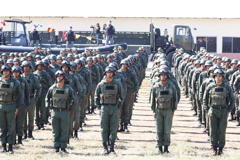 Venezuelan soldiers take part in a military exercise.