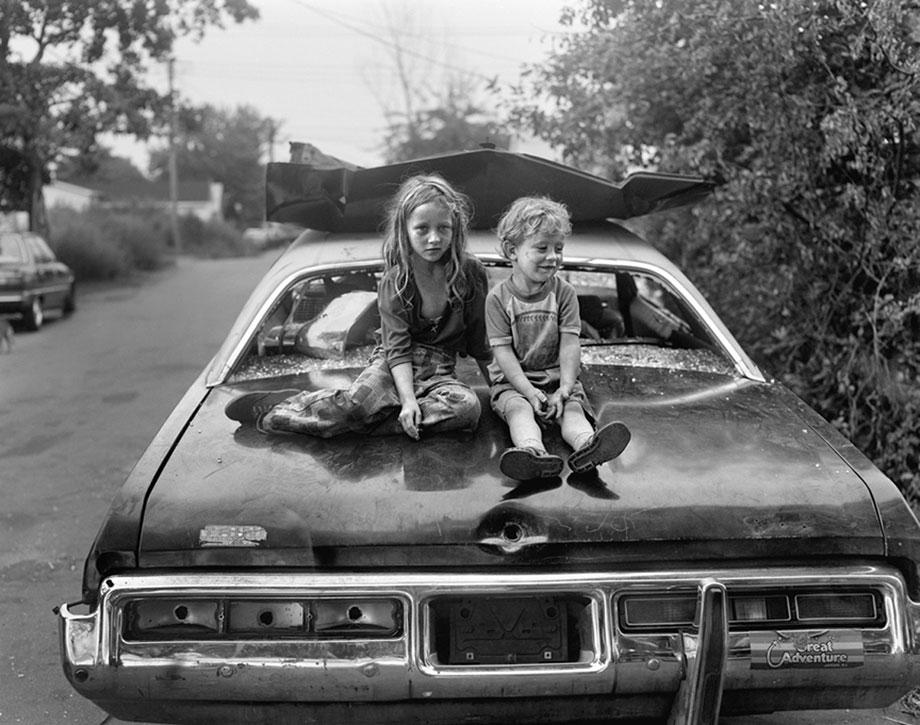 Children on Wrecked Car