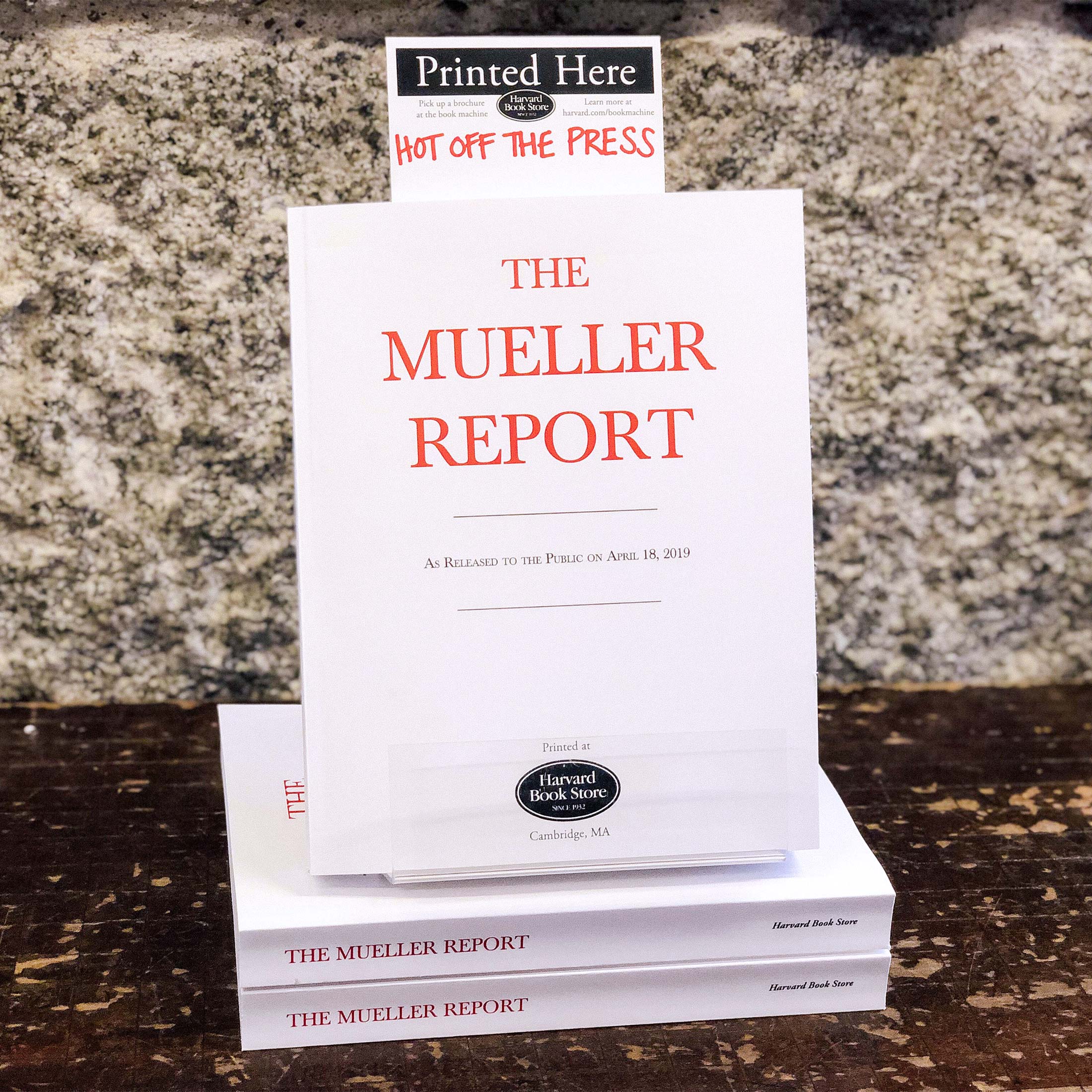 Display of bound copies of the Mueller report at the Harvard Book Store.