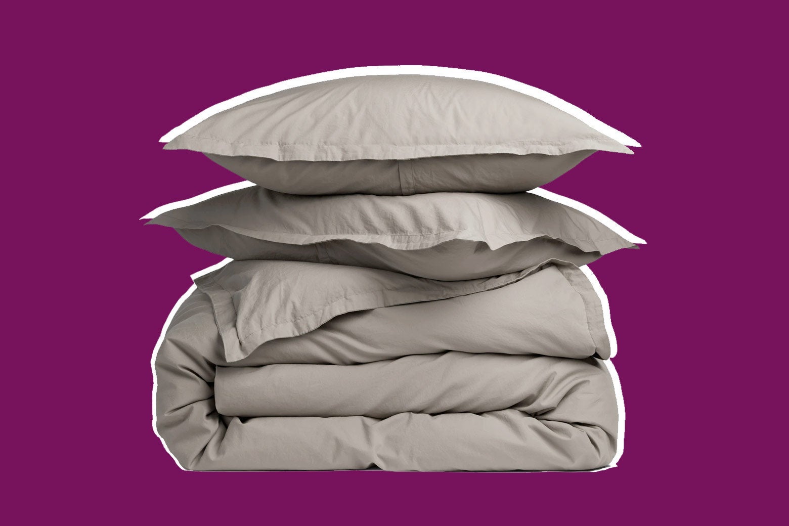 Folded duvet with two pillows stacked on top