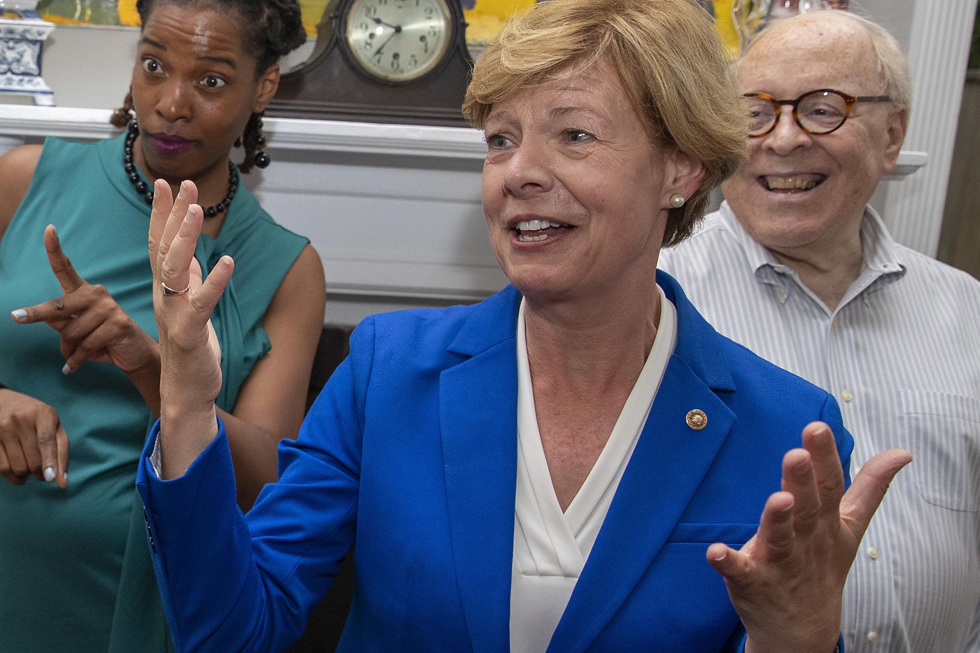 Tammy Baldwin gestures while speaking