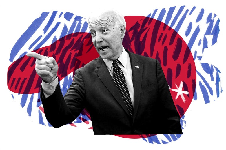 Joe Biden points toward his right.
