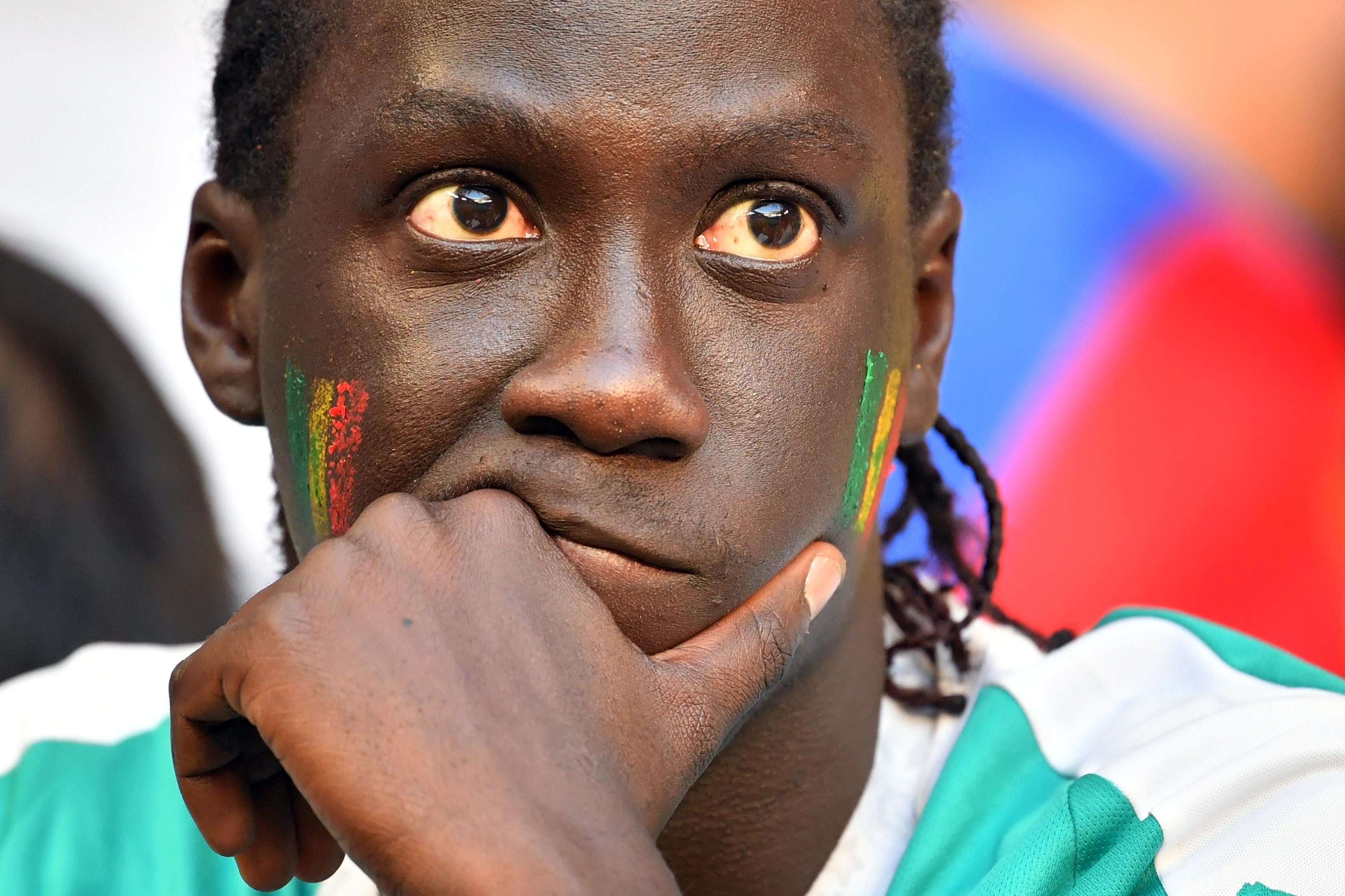 A sad Senegal fan.