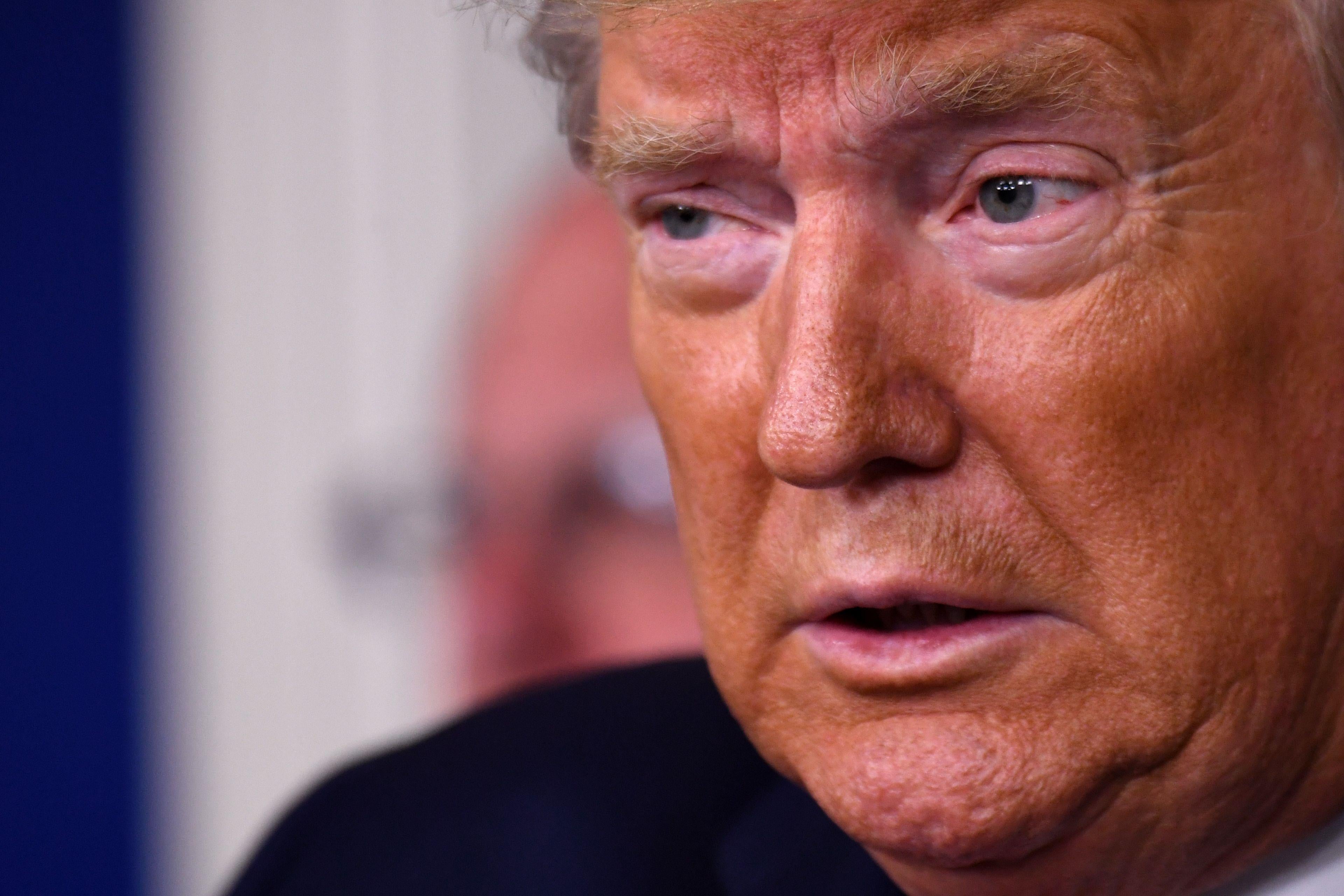 A close-up of Trump's big orange face.