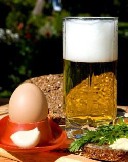 Egg in the vicinity of beer.