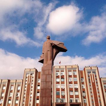 A statue of Lenin in front of the Parliament building. Tiraspol, Moldova. November 2013.