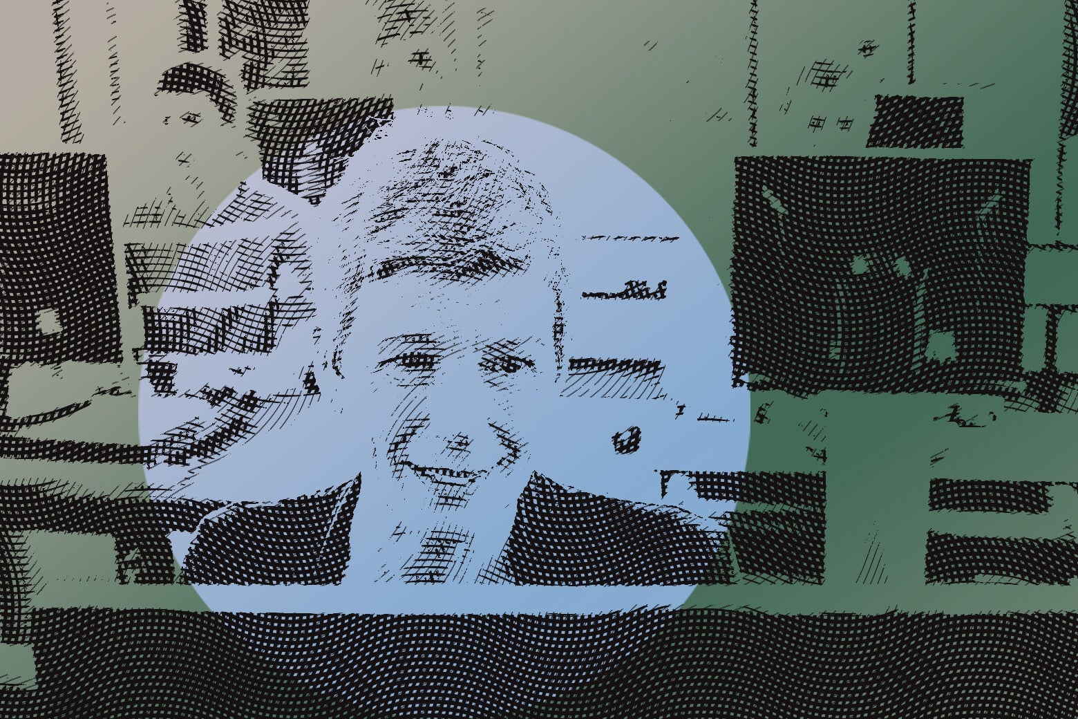Woman in her 60s sitting behind a computer and smiling