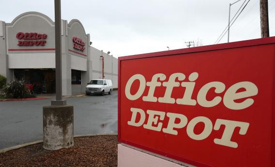 A sign is posted in front of an Office Depot store on Feb. 19, 2013, in San Rafael, Calif.