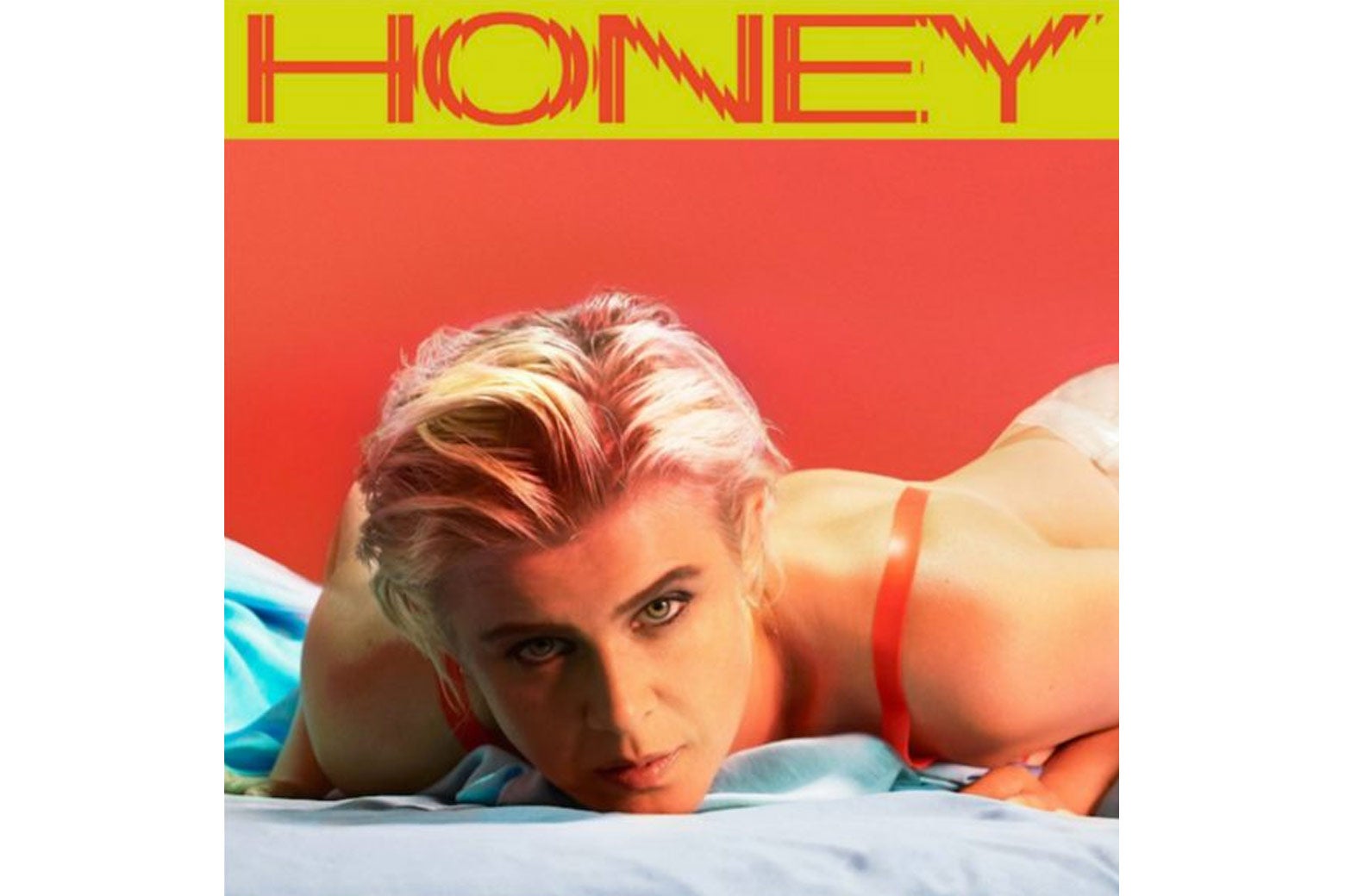 The cover of Robyn's new album, Honey. Robyn is lying on her chest in lingerie, looking forward.