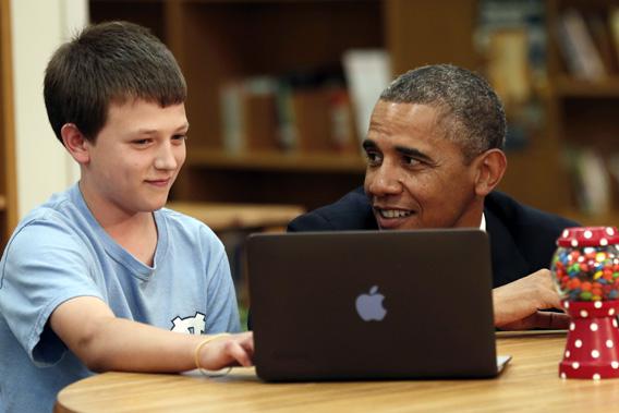 President Obama is shown digital learning programs during a visit to Mooresville Middle School in Mooresville, N.C., June 6, 2013.