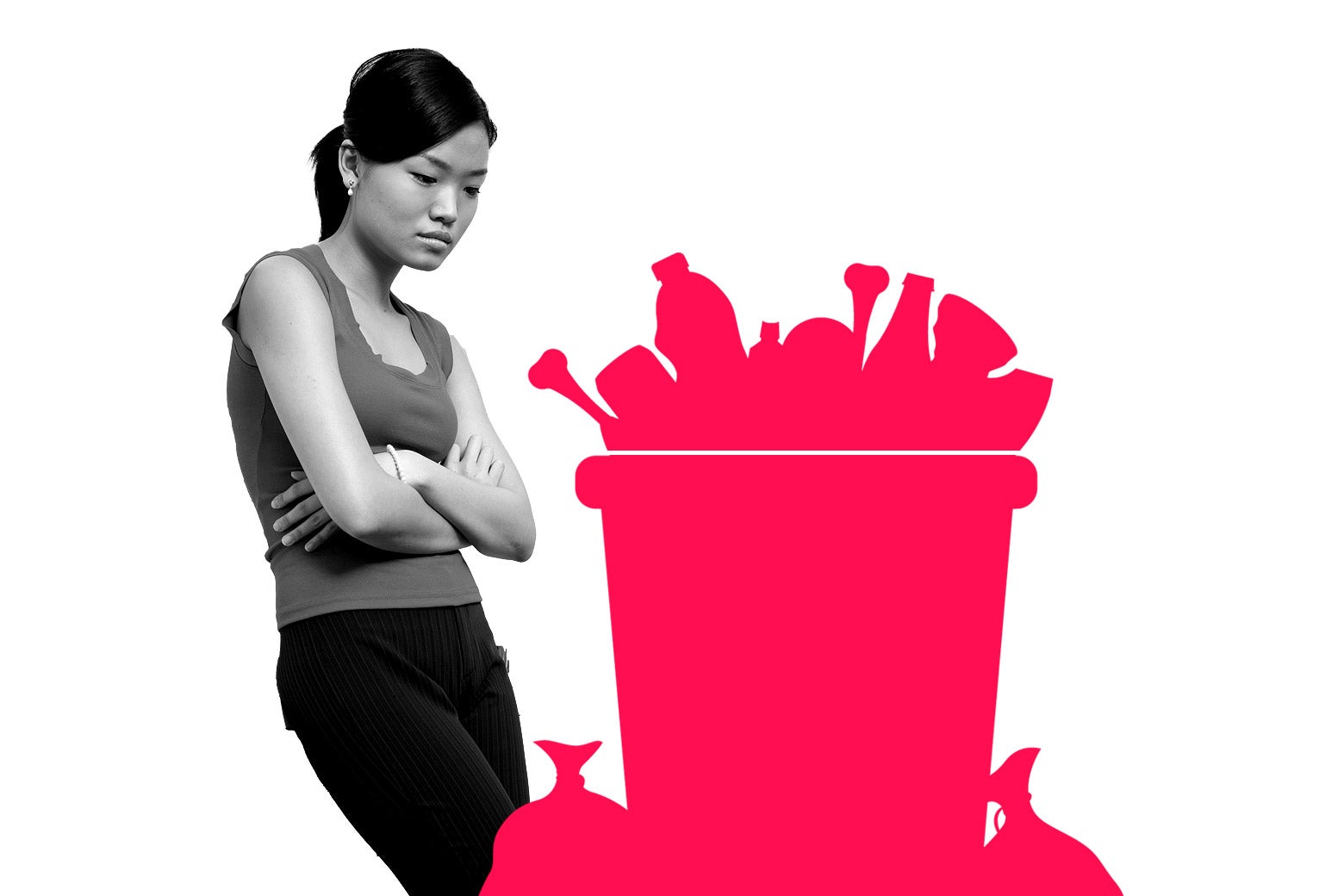 Woman staring at a full trash can.