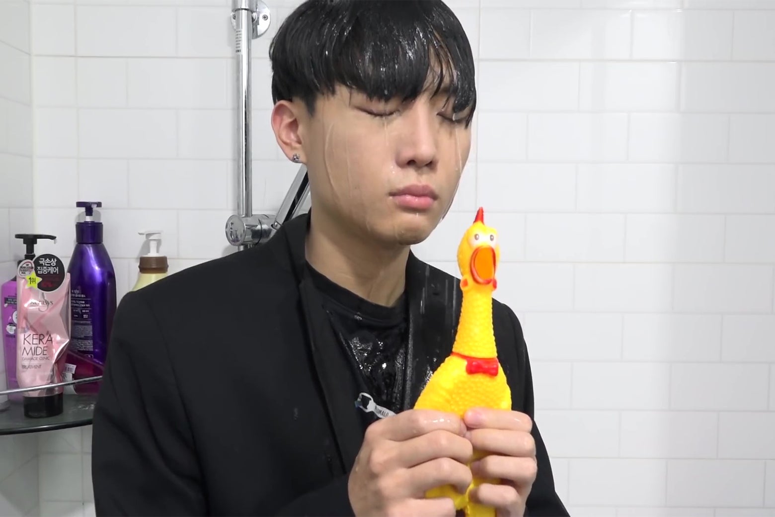 Big Marvel playing the rubber chicken in the shower.