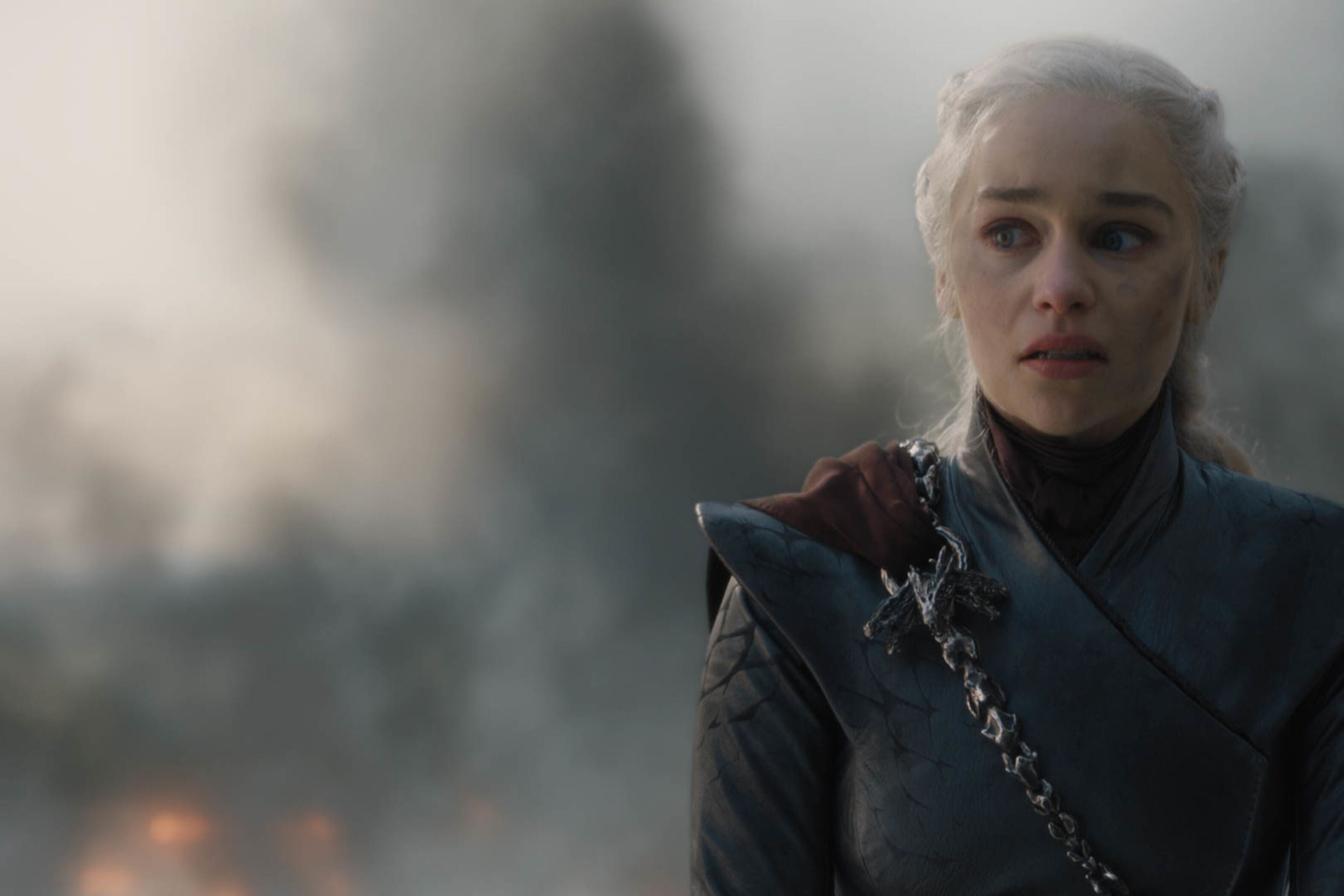 Daenerys Targaryen, her face smudged with soot and a wild look in her eyes.