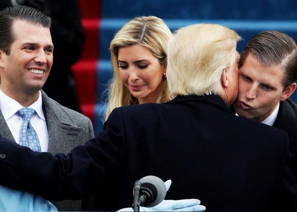 President Donald Trump kisses his son Eric Trump after his inauguration on the West Front of the U.S. Capitol on January 20, 2017 in Washington, DC.