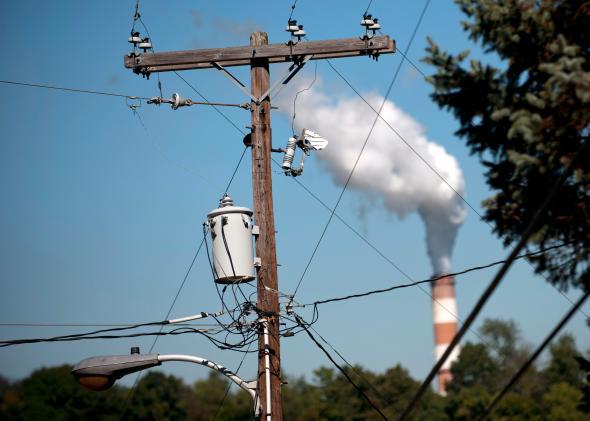 Energy-related carbon emissions rose 2 percent in 2013 as some utilities switched back from natural gas to coal.