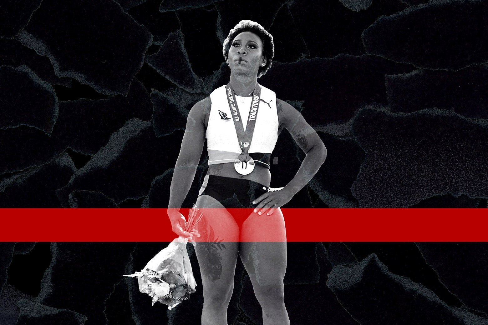 Gwen Berry holds flowers while wearing her medal at the U.S. Olympic trials.